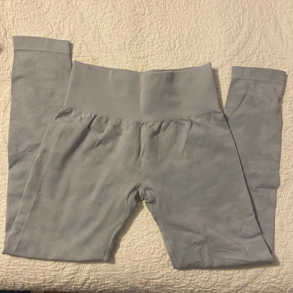 NVGTN light blue leggings.
